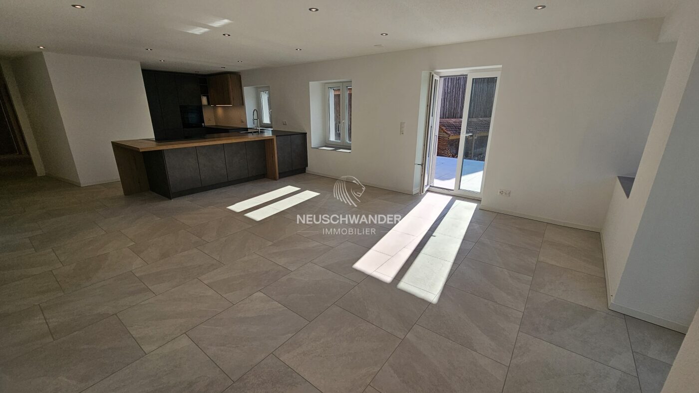 Cuisine agencée et habitable ouverte sur le salon/séjour