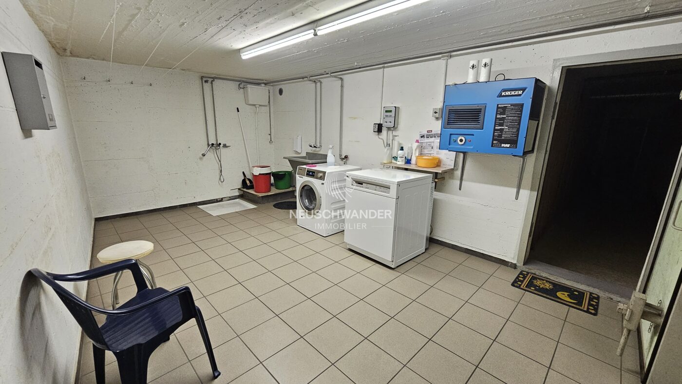 Buanderie commune au sous-sol