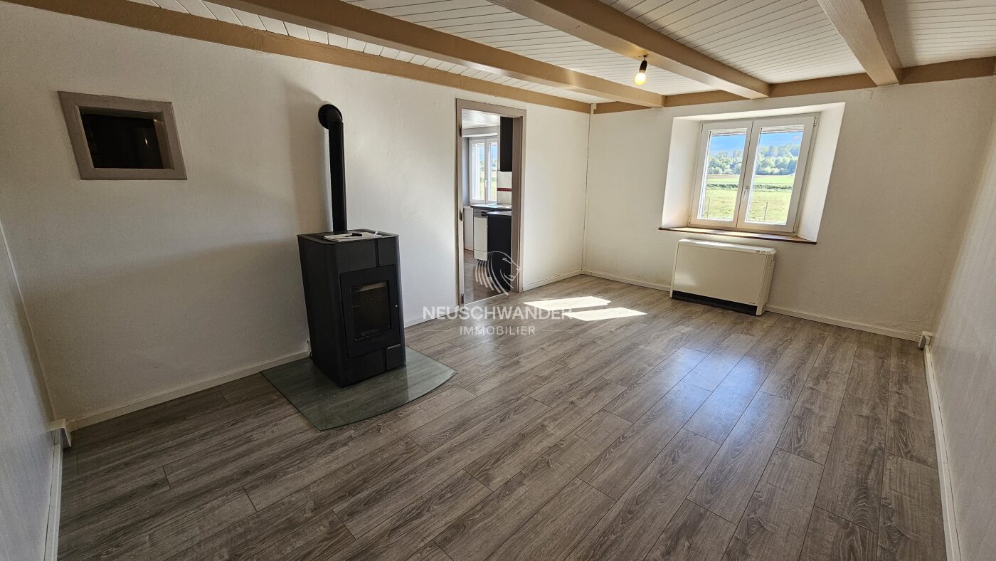 Séjour / salle à manger avec poêle
